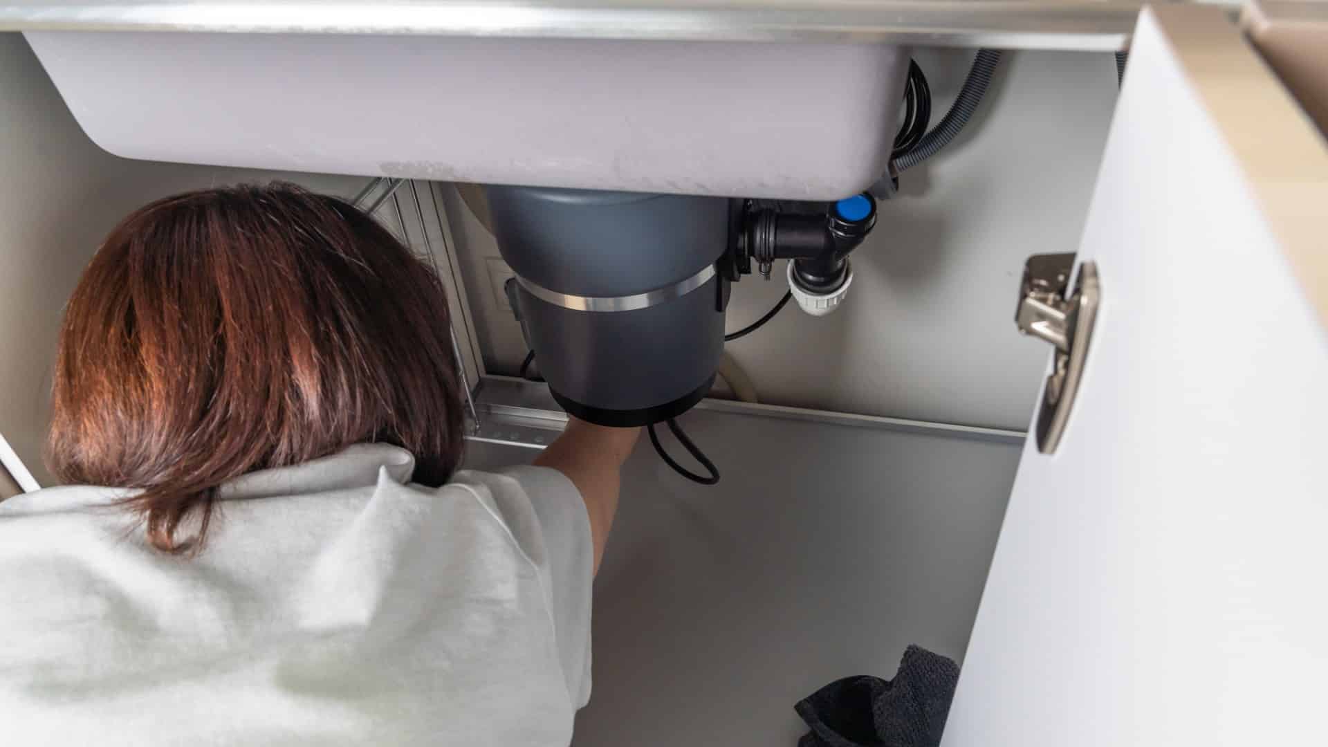 waste-disposal-leak-under-sink